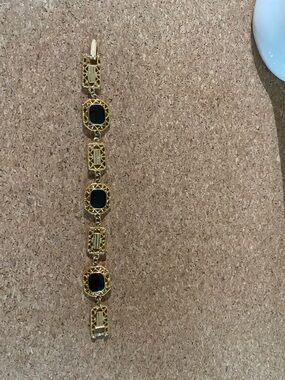 Gold-Tone Bracelet with Black Gem Accents